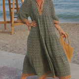Luna · Vestido maxi de Mulher com estampado com decote em V