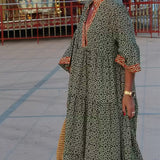 Luna · Vestido maxi de Mulher com estampado com decote em V